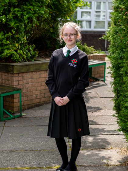Aleksandra in her Holy Cross uniform